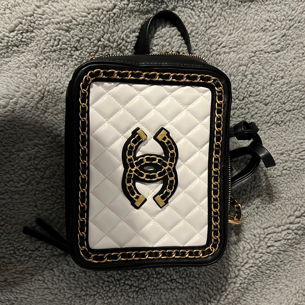 White and black Chanel shoulder bag
